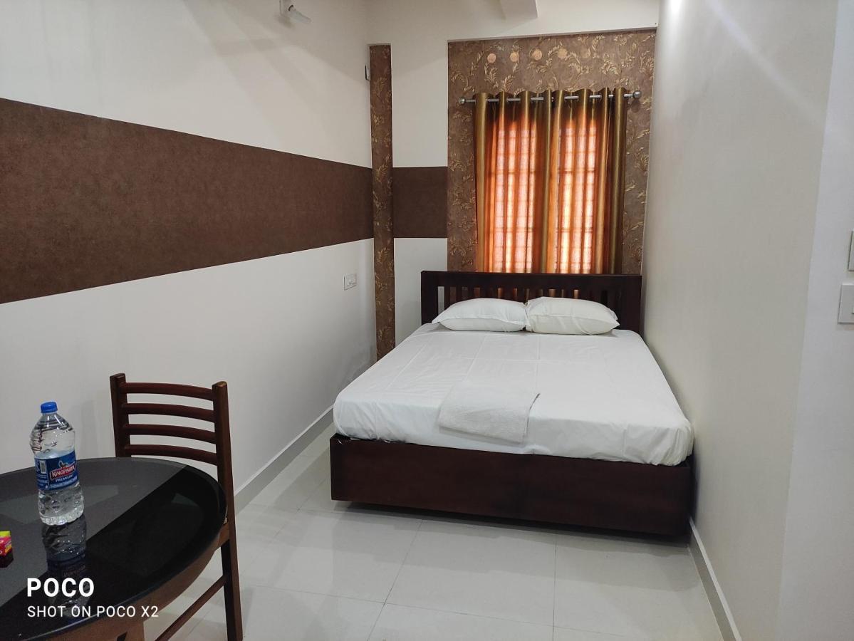 Coral Homes Kochi ภายนอก รูปภาพ